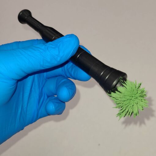Magnetic wand with green latent powder